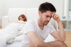 Will Male Enhancement Ever Go Mainstream - Worried man in the bedroom (Shutterstock)