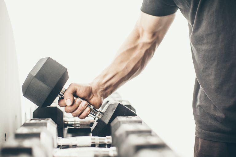 Man Lifting Dumbbell (Getty)